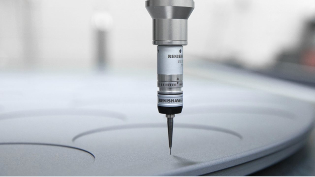 A touch-trigger probe measuring a machined disc on a coordinate measuring machine.